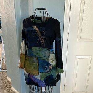 Highly unique, hand made woolen top.